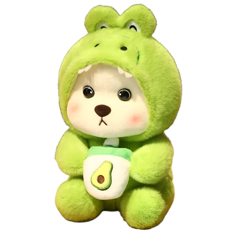 Green plush toy with avocado design on a wooden surface

